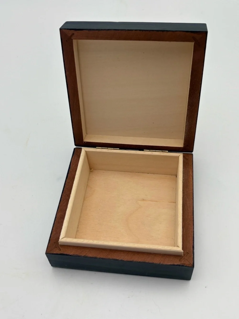 Bright Yellow Sun on Deep Blue Wooden Box